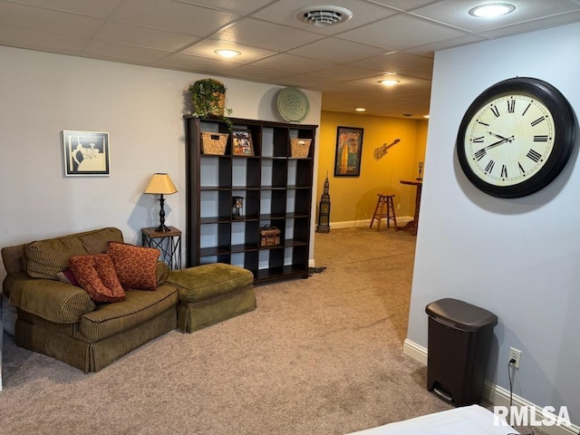 carpeted living room with recessed lighting, baseboards, visible vents, and a paneled ceiling