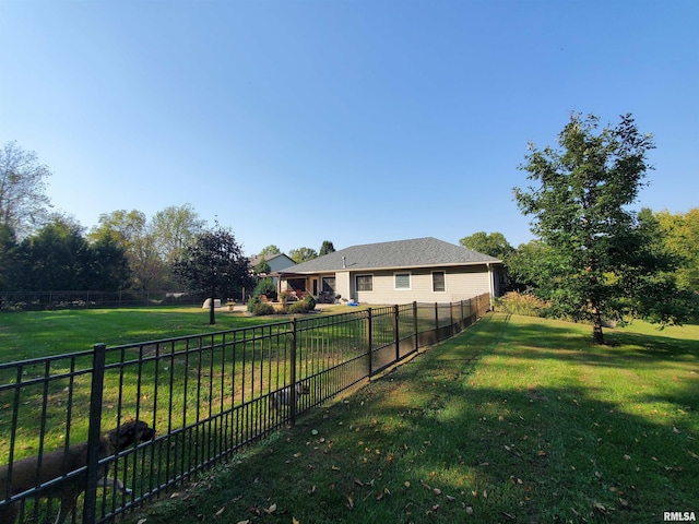 view of yard with a fenced backyard