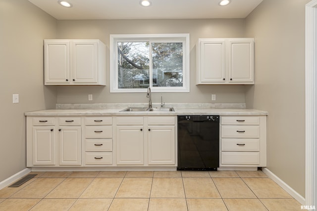 kitchen with light tile patterned floors, recessed lighting, a sink, visible vents, and black dishwasher