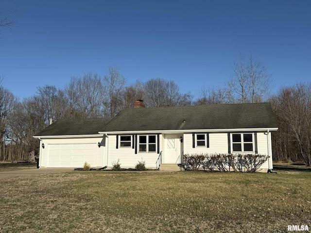 ranch-style home with a front lawn, driveway, a chimney, and an attached garage