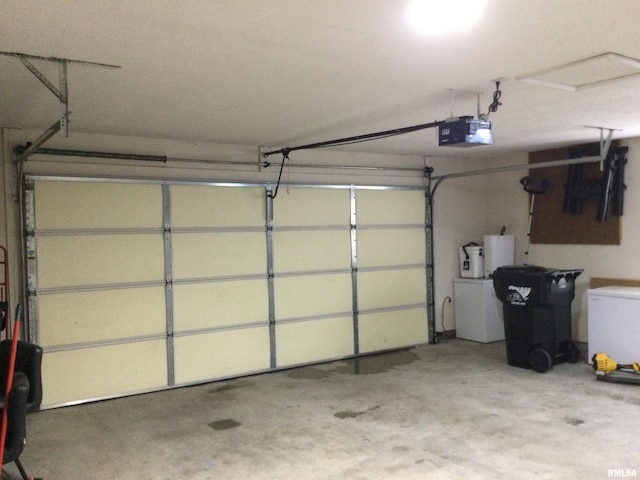 garage featuring a garage door opener