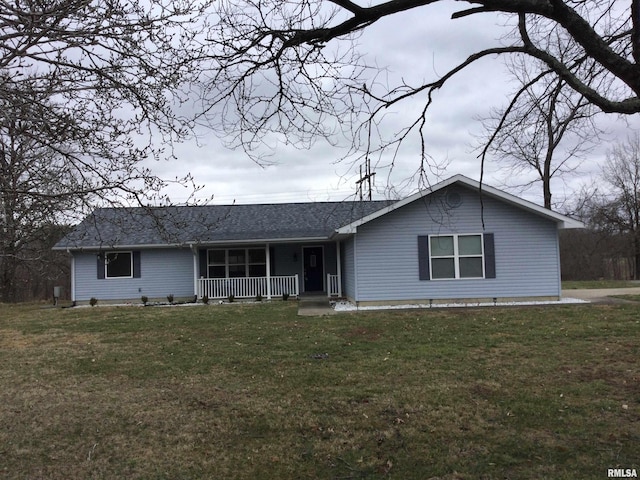 single story home featuring a porch and a front yard