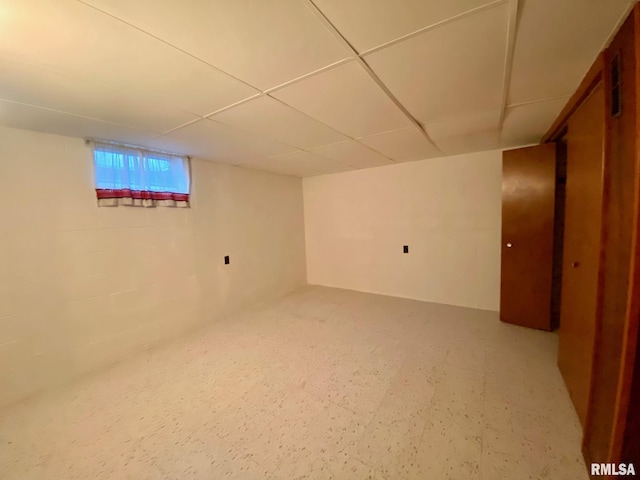 basement with tile patterned floors