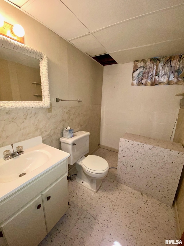 full bath featuring toilet and vanity