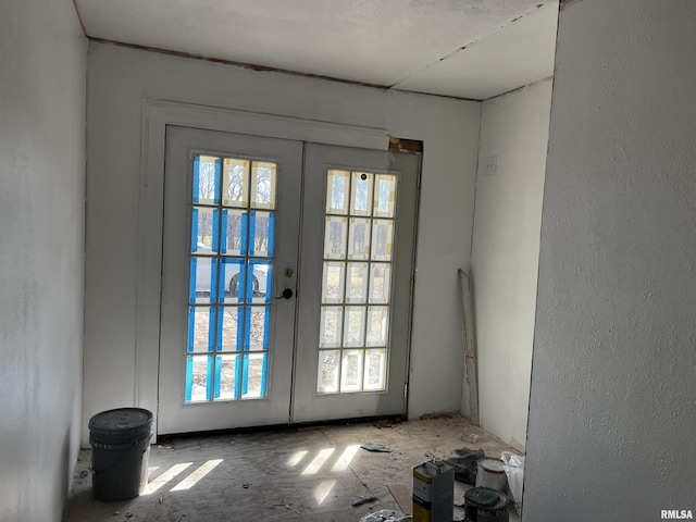 doorway featuring french doors