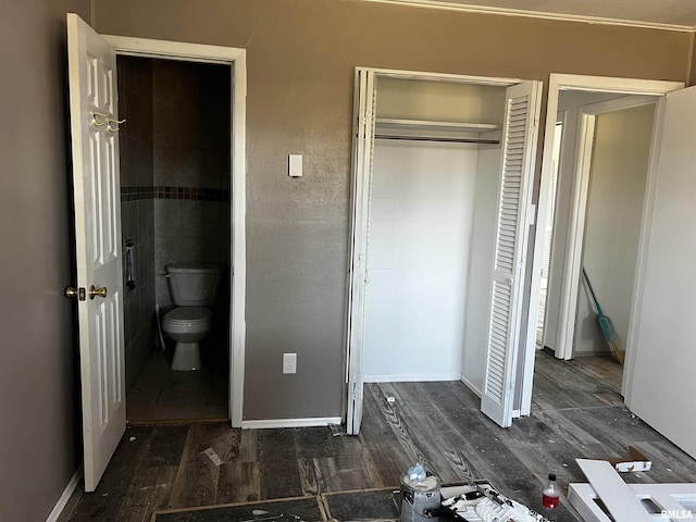 interior space featuring a closet and wood finished floors