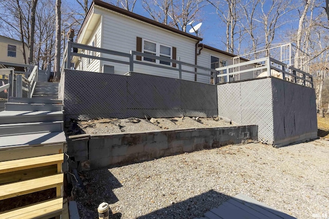 view of home's exterior with stairway