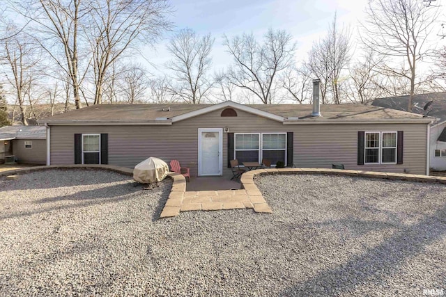 rear view of house featuring a patio area