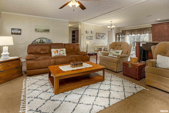 living area featuring a textured ceiling, ornamental molding, and carpet flooring