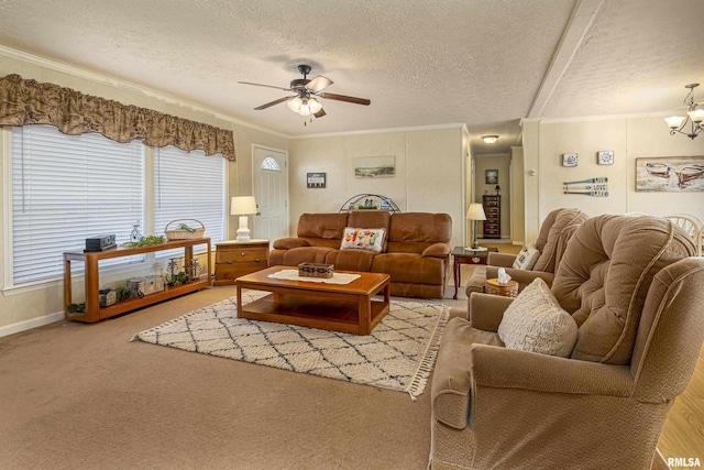 living area featuring crown molding, a textured ceiling, and ceiling fan with notable chandelier