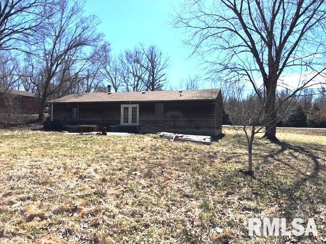 back of property with french doors