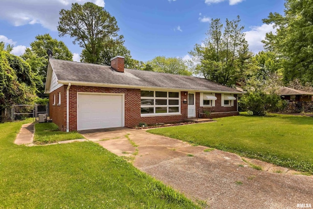 ranch-style house with an attached garage, driveway, a chimney, and brick siding