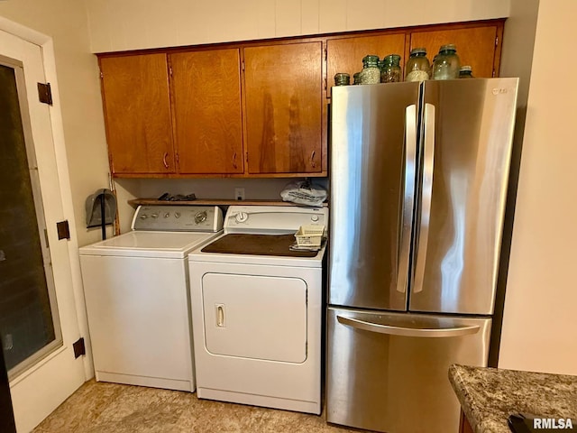 washroom featuring washing machine and dryer