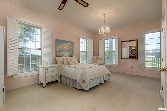 bedroom with light carpet, multiple windows, baseboards, and crown molding