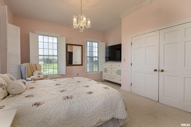 carpeted bedroom featuring ornamental molding, multiple windows, a closet, and a notable chandelier