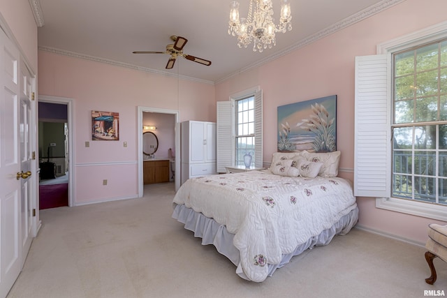 bedroom featuring connected bathroom, light colored carpet, crown molding, and baseboards