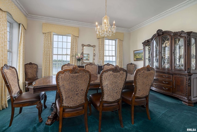 dining room with an inviting chandelier, dark carpet, and crown molding