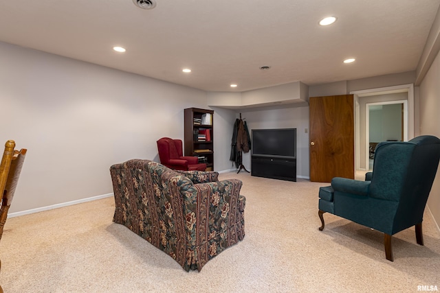 living area featuring baseboards, carpet floors, visible vents, and recessed lighting