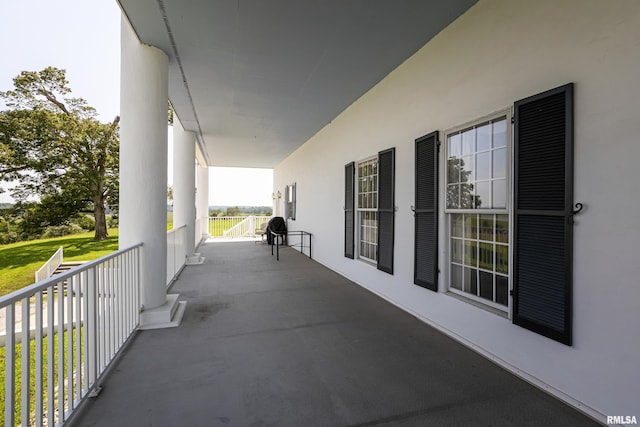 view of patio with a balcony