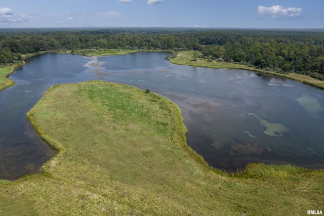 aerial view with a water view and a forest view