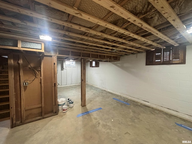 unfinished basement with stairs