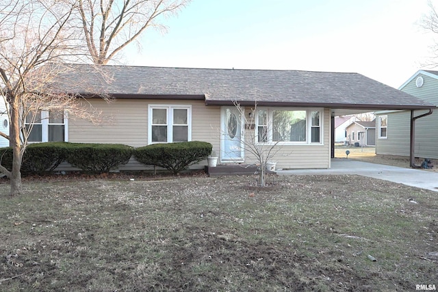 view of front of house featuring roof with shingles