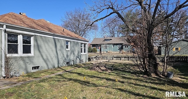 view of yard featuring fence