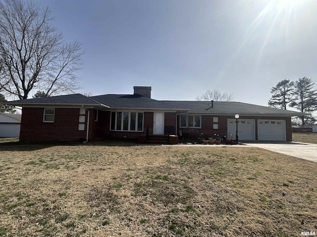 ranch-style home with concrete driveway, a chimney, an attached garage, a front lawn, and brick siding