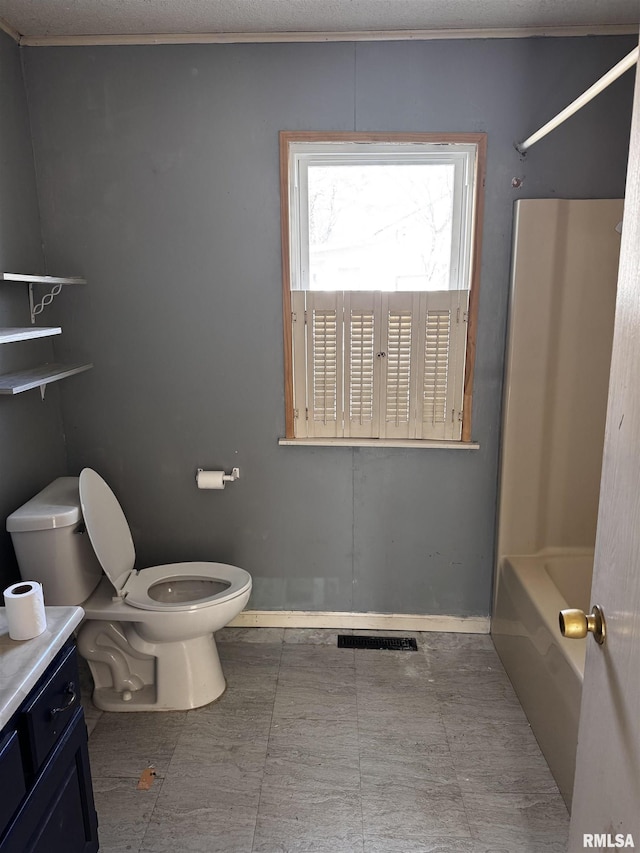 bathroom with toilet, shower / bath combination, visible vents, and vanity