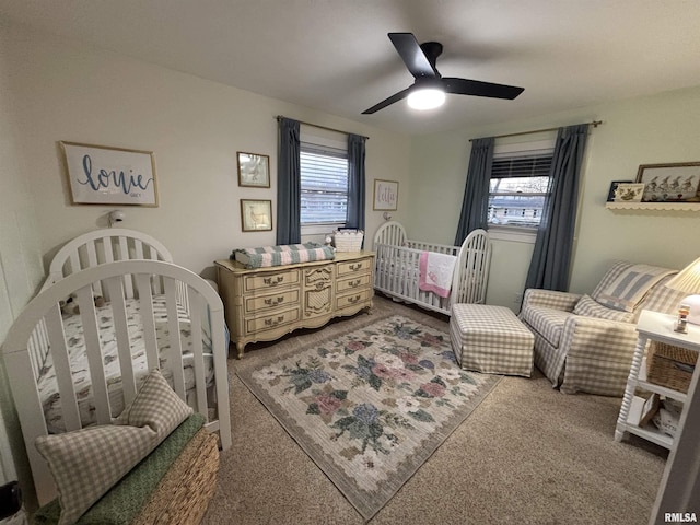 carpeted bedroom with ceiling fan