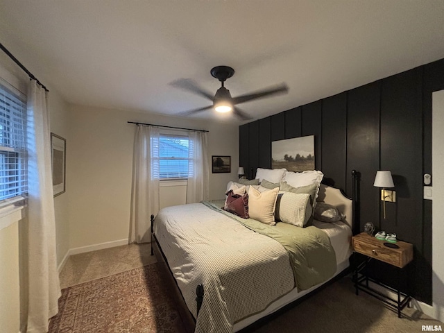 bedroom with carpet, baseboards, and ceiling fan