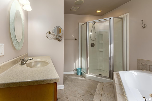 full bathroom with a stall shower, tile patterned flooring, visible vents, and a garden tub