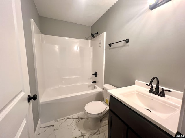 bathroom featuring toilet, marble finish floor, shower / washtub combination, and vanity