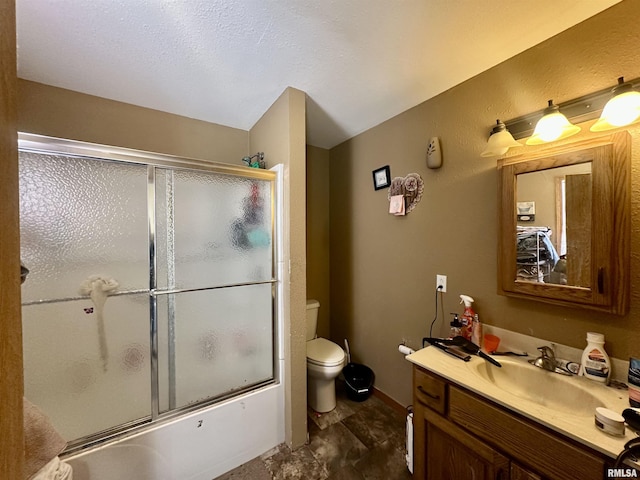 full bathroom with vanity, toilet, and enclosed tub / shower combo