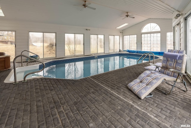 view of swimming pool featuring a covered pool and ceiling fan