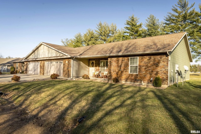 112 Mcvicker Dr, Energy, IL 62933 - view of front of property with an attached garage, concrete driveway, and a front yard