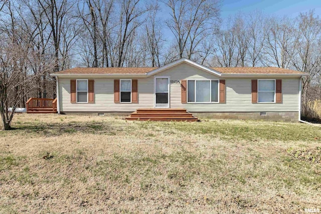 view of front of house featuring a front lawn and crawl space