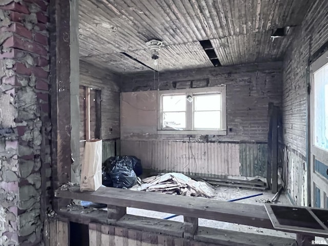 miscellaneous room with wood ceiling