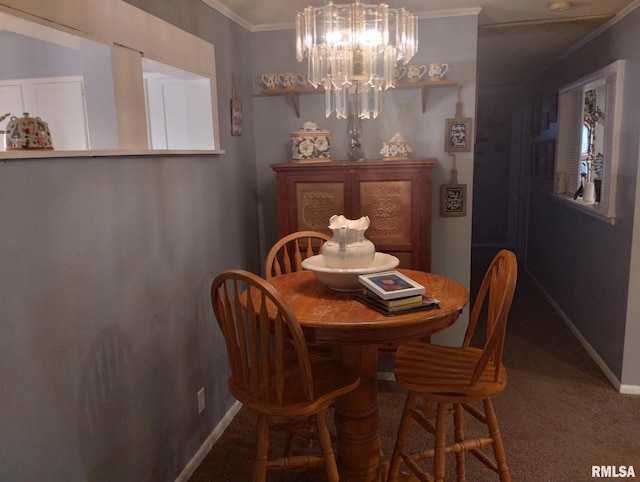 dining area featuring baseboards, carpet floors, a chandelier, and crown molding