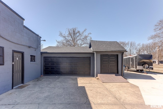 garage with driveway