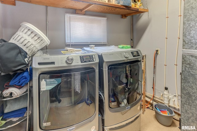 laundry area with laundry area and washing machine and dryer