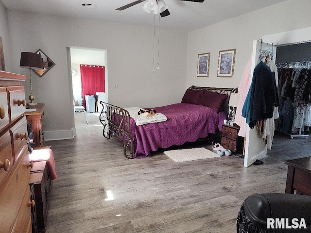 407 N Ohio St, Mound City, IL 62963 - bedroom with baseboards, wood finished floors, and a ceiling fan