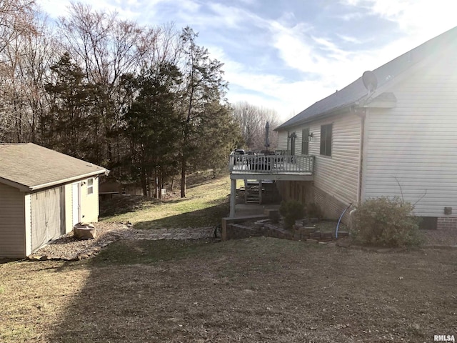 view of yard featuring stairway and a wooden deck