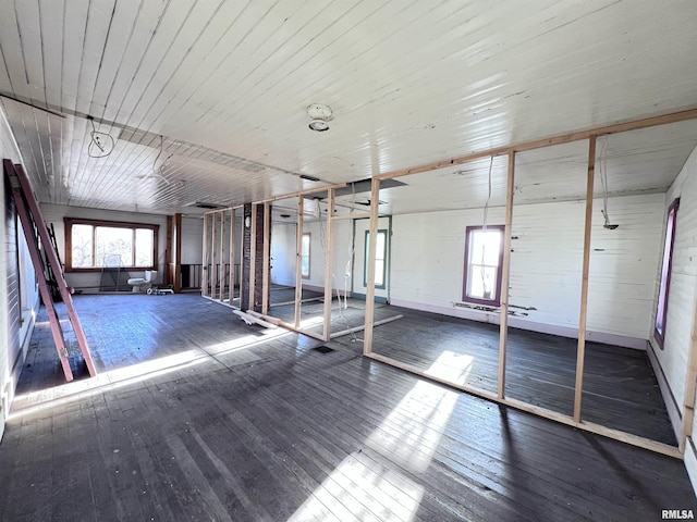 misc room featuring hardwood / wood-style floors and wood ceiling