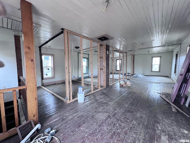 miscellaneous room featuring wood-type flooring and wooden ceiling