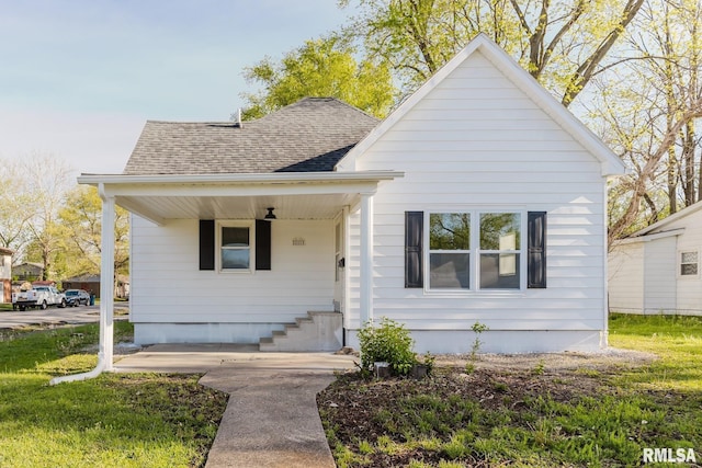 bungalow with a shingled roof