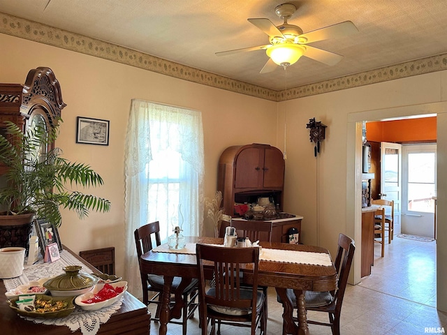 dining room with a ceiling fan