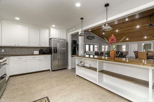 kitchen with open shelves, stainless steel fridge with ice dispenser, white cabinets, decorative light fixtures, and backsplash