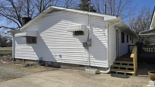 view of property exterior with crawl space