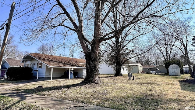 exterior space featuring an outdoor structure and a storage unit